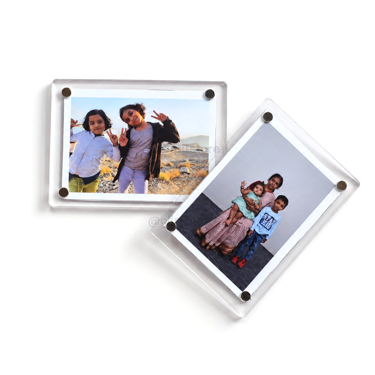 Pair of acrylic polaroid fridge magnets in landscape orientation