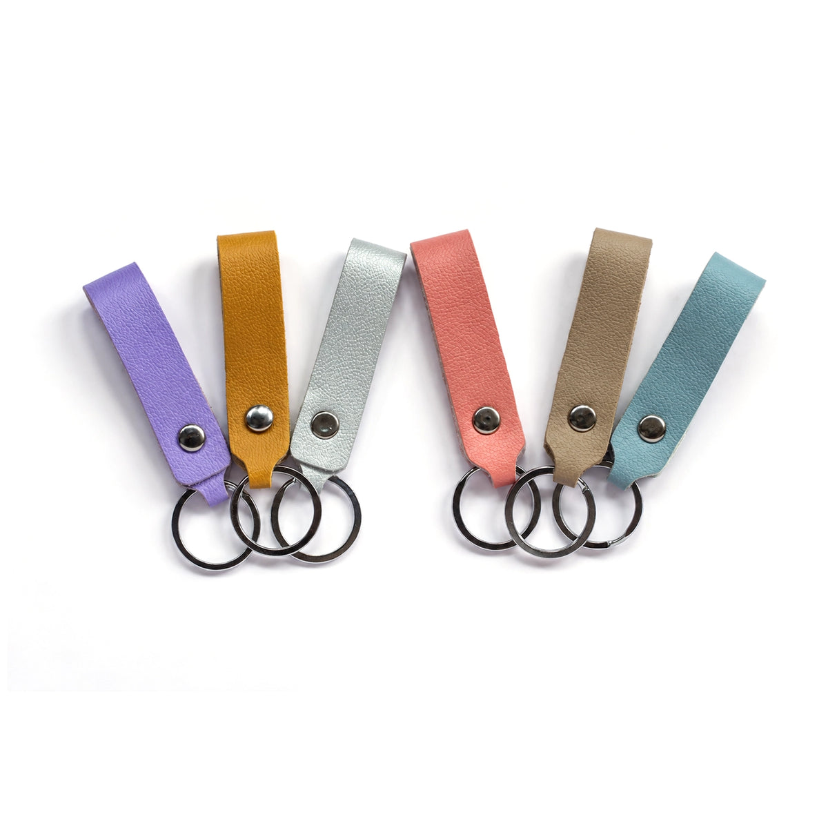 Leather strap keychains in lilac, mustard, silver, coral, beige and sky blue