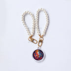 Pearl wristlet photo keychain with colourful deity artwork