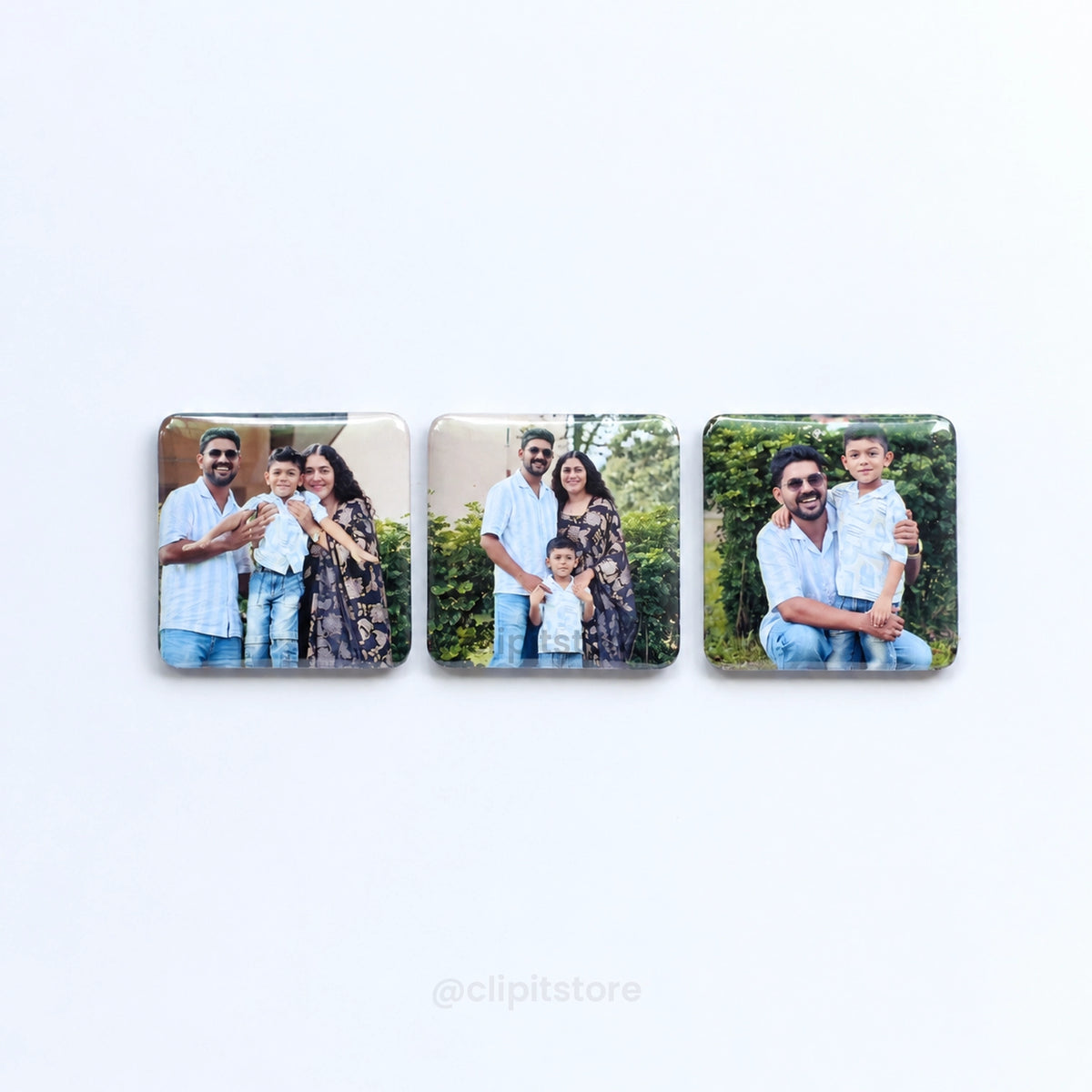 Three square photo fridge magnets in a row
